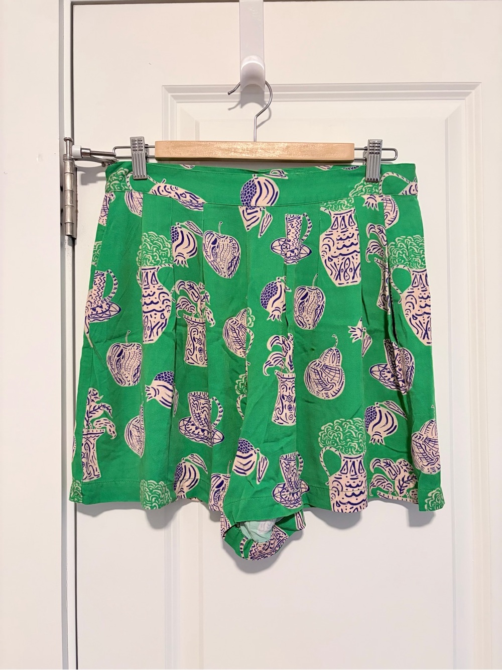 Corey Lynn Calter for Anthropologie green shorts with pink illustration print